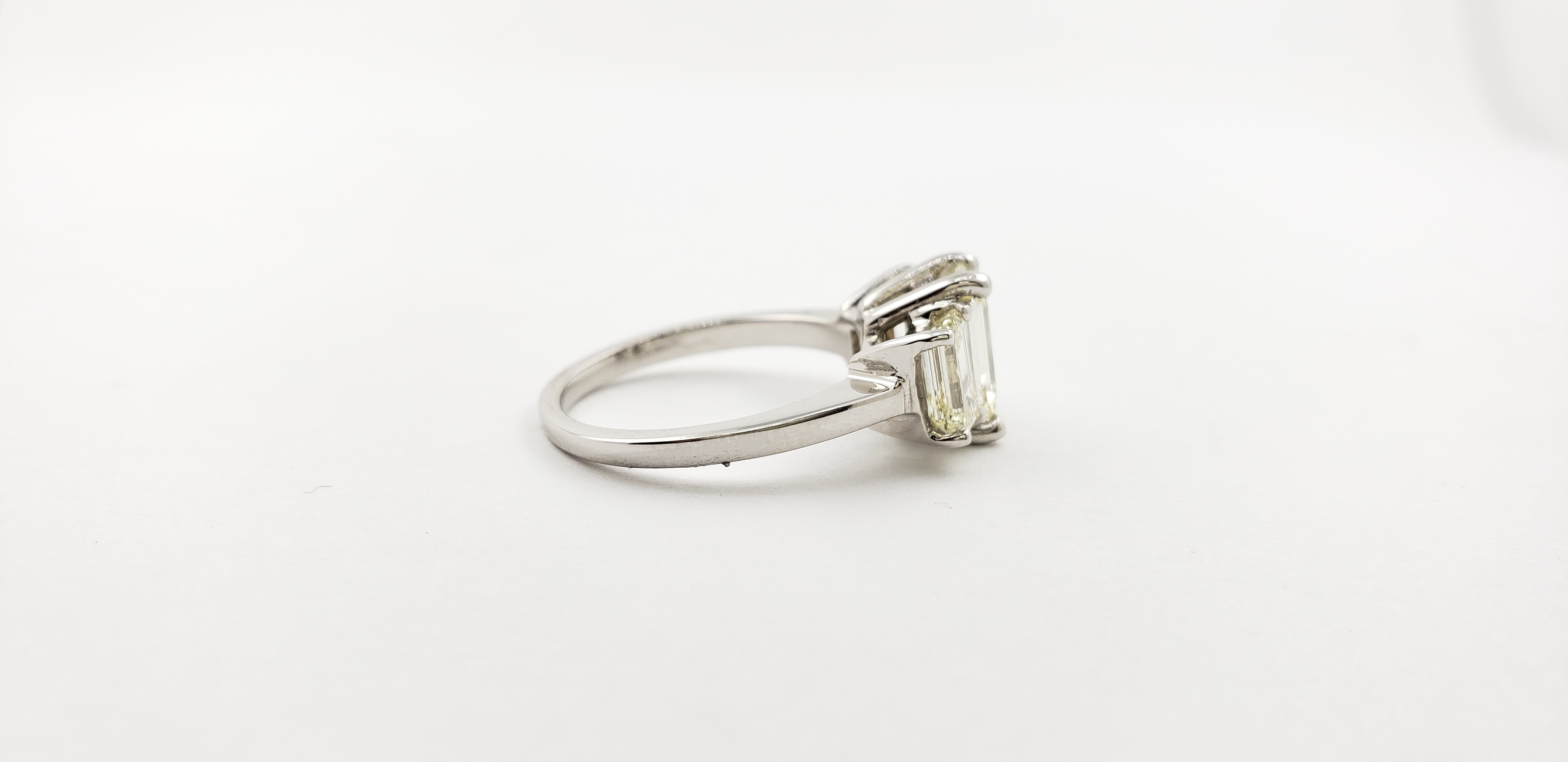 Three-Stone Emerald Cut Diamond Ring